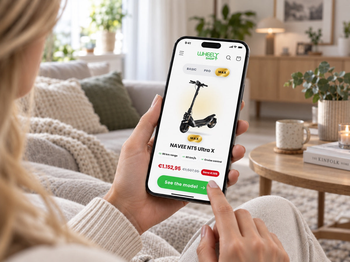Kund som lägger en order på en elsparkcykel i Wheelyshops mobilbutik – varje order planterar ett träd