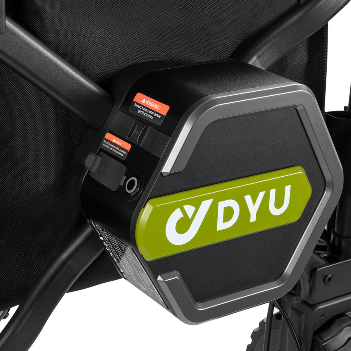 DYU Campx, närbild på sexkantigt batteri med DYU-logotyp, varningsetiketter och port på ramen