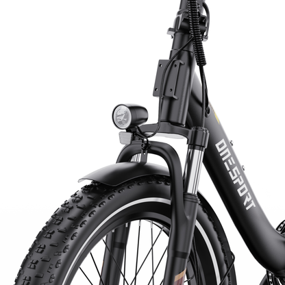 OneSport OT16 Pro närbild på framlykta, fjädergaffel, stänkskärm och grovmönstrat framdäck
