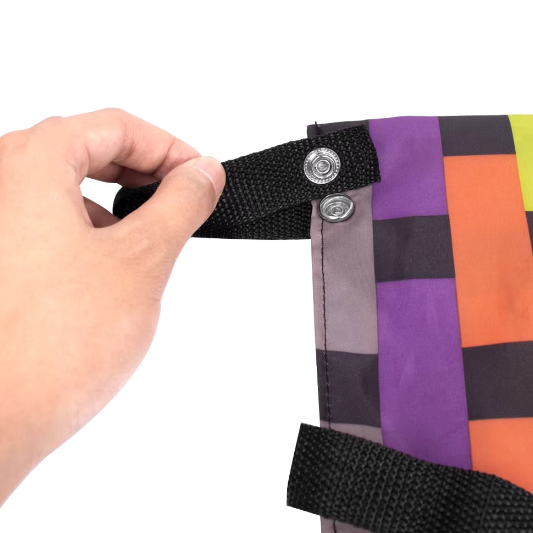 Detalj av styrväska Pocket Edition med flerfärgat mönster