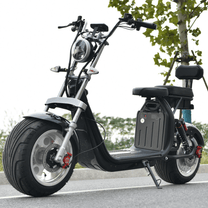 eHoodax X10 City Road elsparkcykel sedd från sidan på en väg
