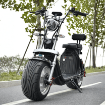 eHoodax X10 City Road elsparkcykel rakt framifrån på en väg