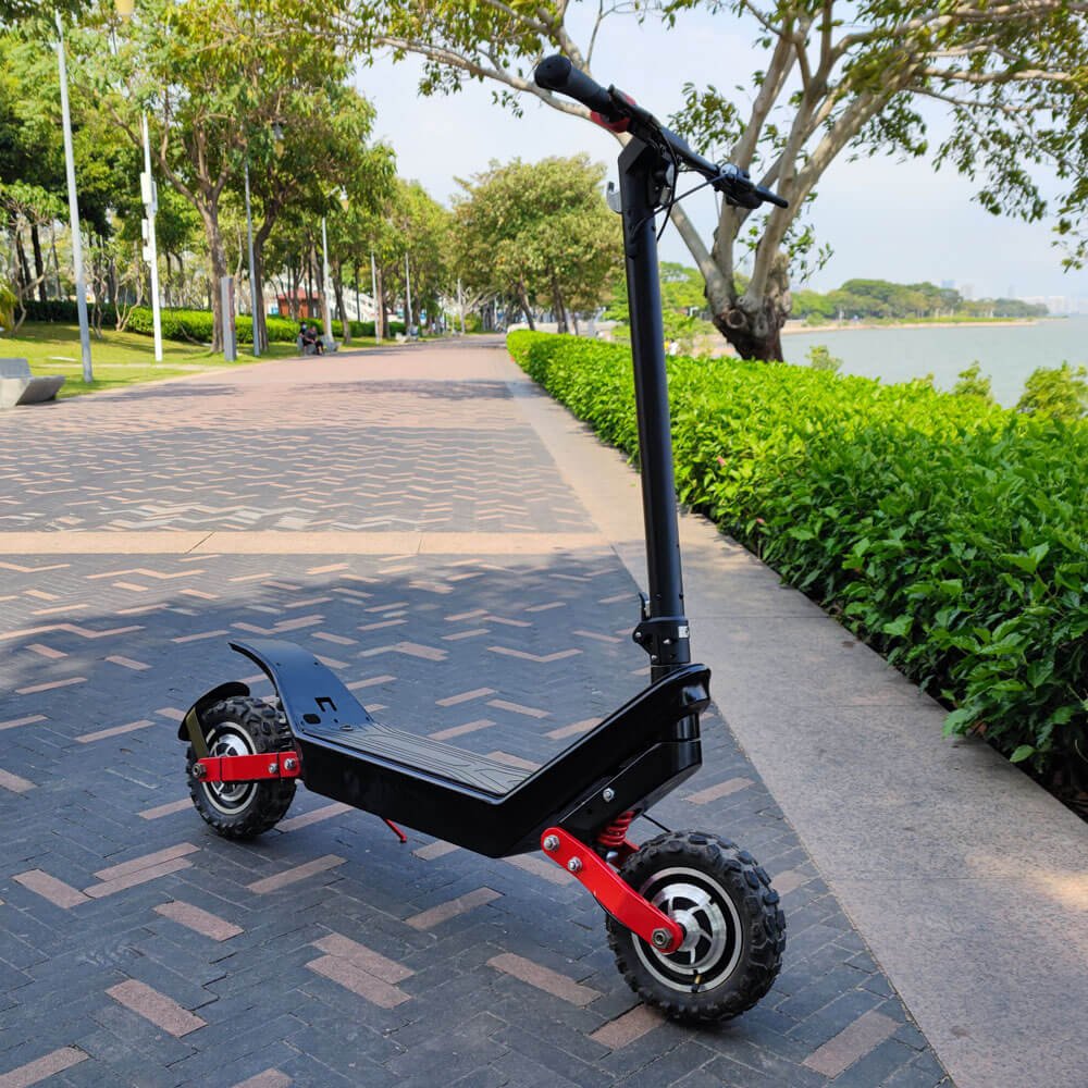 HX X10 elsparkcykel snett framifrån på en gångväg