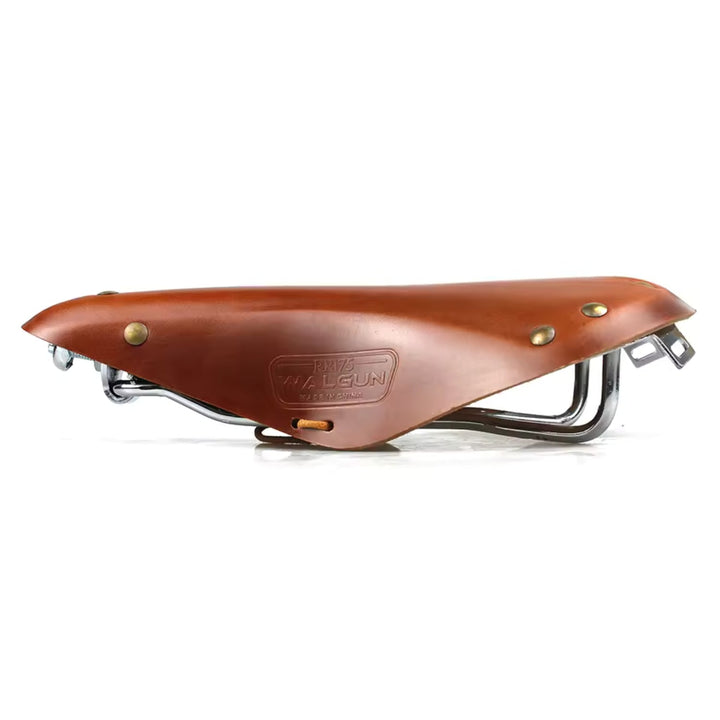Elcykelsadel Leather Edition i brunt, sedd från sidan